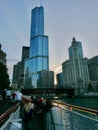 Tourists on Chicago River evening sightseeing cruise gaze at skyscrapers, Chicago, Illinois Royalty Free Stock Photo