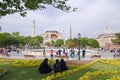 Tourists and citizens walk on Sultanahmet square