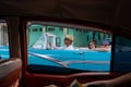 Tourists in a classic convertible on a street in Old Havana. Cuba Royalty Free Stock Photo