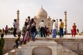 Tourists Climb stairs at the Taj Mahal