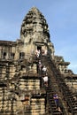 Tourists Climbing Angkor Wat Royalty Free Stock Photo