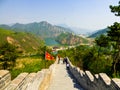 Tourists climbing Huanghuacheng Great Wall