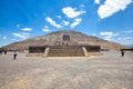 Tourists climbing landmark ancient Teotihuacan pyramids in Mexican Highlands