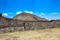 Tourists climbing landmark ancient Teotihuacan pyramids in Mexican Highlands