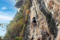Tourists climbing limestone cliffs in Ao Nang, Krabi, Thailand 13 march 2023