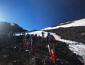 Tourists climbing on a mountain