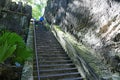 Tourists climbing Queen`s Staircase