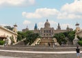 Tourists climbing the stairs and the fountain of the National Museum of Montjuic. Barcelona. Spain.