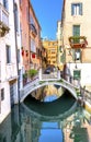 Touirists Colorful Small Side Canal Bridge Venice Italy