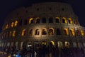 Tourists at the Colosseum at night