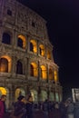 Tourists at the Colosseum at night