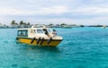 Tourists coming by speedboats to the international airport of Ibrahim Nasir