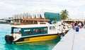 Tourists coming by speedboats to the international airport of Ibrahim Nasir