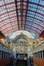 Tourists and commuters in the beautiful historic Antwerp Central train station Royalty Free Stock Photo