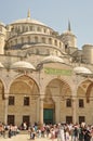 Tourists in the courtyard of Sultanahmet Mosque Royalty Free Stock Photo