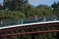 Tourists crossing new modern bridge in Venice, Italy