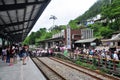 Tourists crossing on railway track alongside Shifen Old Street from Shifen Station, Taiwan Royalty Free Stock Photo