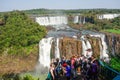 Tourists crowded at viewpoint platform in wonderful Iguacu Falls