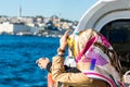 Tourists on a cruise ship enjoying great view of seascape at the Bosphorus  strait in Istanbul, vacation concept Royalty Free Stock Photo