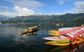 Tourists on the Dal Lake by boat in Srinagar, India