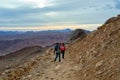 Tourists descend on stony trail from Mount Moses, Egypt Royalty Free Stock Photo