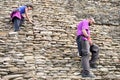 Tourists descend the main pyramid at Tonina archeological site i Royalty Free Stock Photo