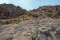 Tourists descend from Mount Moses, Egypt Royalty Free Stock Photo