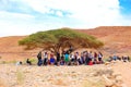 Tourists in desert shade, Israel