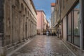 Tourists dining in outdoor restaurants in narrow streets of the old town district, Zadar Royalty Free Stock Photo
