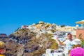 Tourists sightseeing in the incredible Fira town Santorini island Greece Royalty Free Stock Photo