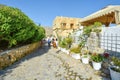Tourists walk a stone path on the island of Rhodes Greece