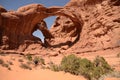 Tourists at Double Arch in Arches NP