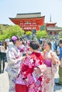 Tourists dressing up in traditional Kimono at Kiyomizu-dera Temple, famous Buddhist temple in Kyoto, Japan Royalty Free Stock Photo