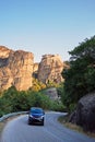 Tourists driving around in the streets of Meteora