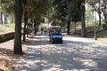 Tourists driving electric car in Villa Borghese, Rome