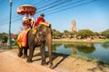 Tourists on an elephant ride tour Royalty Free Stock Photo