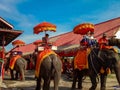 Tourists With an Elephant at Wat Chaiwatthanaram temple in Ayuthaya Historical Park, a UNESCO world heritage site in Thailand. Royalty Free Stock Photo