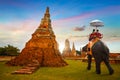 Tourists with an Elephant at Wat Phra Si Sanphet temple in Ayutthaya Historical Park, Thailand Royalty Free Stock Photo