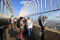 Tourists on the Empire State Building observation deck in Manhattan Royalty Free Stock Photo