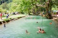 Tourists enjoy at Blue Lagoon, Vangvieng, Laos Royalty Free Stock Photo