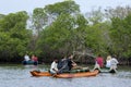 Tourists enjoy a late afternoon paddle boat ride on the Pottuvil Lagoon on the east coast of Sri Lanka.