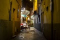 Tourists enjoy a late dinner at a cafe in a narrow alley in the Vieux Nice Old Town of Nice, France, on the French Riviera