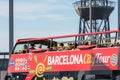 Tourists enjoy sightseeing tour on a hop-on-hop-off city bus in Royalty Free Stock Photo