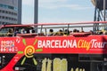 Tourists enjoy sightseeing tour on a hop-on-hop-off city bus in Royalty Free Stock Photo