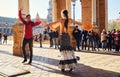 Tourists enjoy street flamenco dance show. Seville, Spain Royalty Free Stock Photo