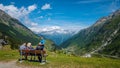 Tourists enjoy the stunning scenery in the Swiss Alps - SWISS ALPS, SWITZERLAND - JULY 22, 2019