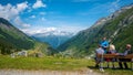 Tourists enjoy the stunning scenery in the Swiss Alps - SWISS ALPS, SWITZERLAND - JULY 22, 2019