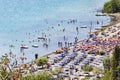 Tourists enjoy sun and watersports in the volcano lake of Castel Gandolfo Royalty Free Stock Photo