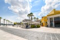 Tourists enjoy a sunny summer day on the waterfront boardwalk at the port city of Brindisi Italy