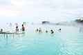 Tourists enjoy taking a bath at Blue Lagoon, Iceland